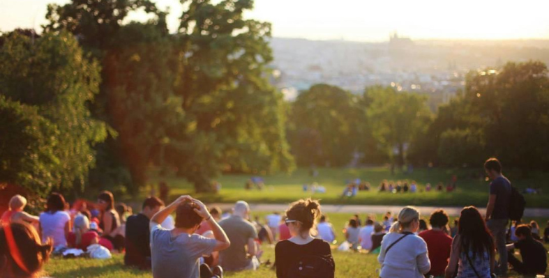 People sitting in a park. 