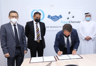 Subrato Saha and V Anandkumar, directors of AquaChemie DMCC, Lorenzo Carollo, CEO of Kurita Middle East, sign the joint venture agreement in the presence of Ahmad Sultan Al Haddad, COO, DP World, UAE. (Image source: Kurita AquaChemie)