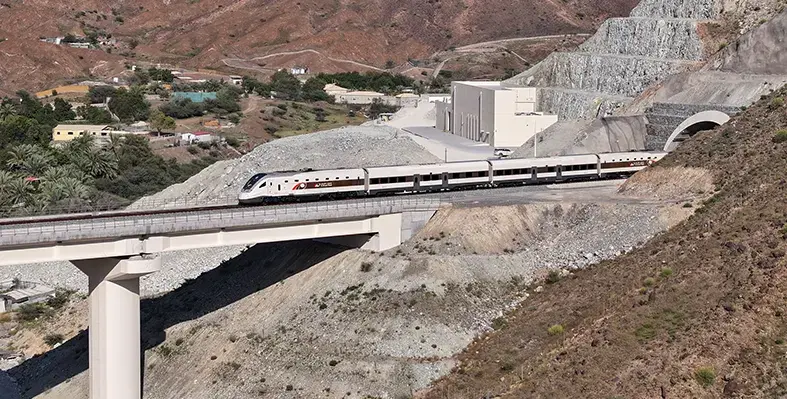 A_train_atop_a_mountainous_railway_track